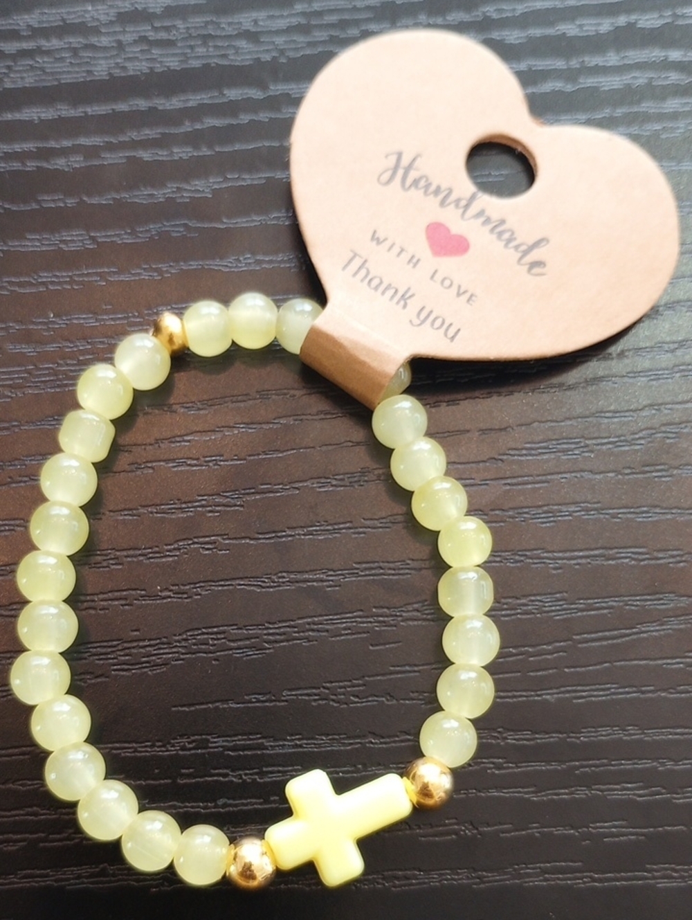 Handmade Pastel Yellow Glass Beaded Bracelet with Cross Accent